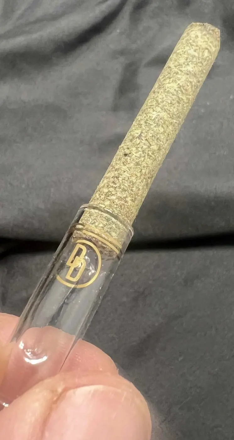 Present-day PURE Preroll concept with custom glass tip and gold DD Signature
